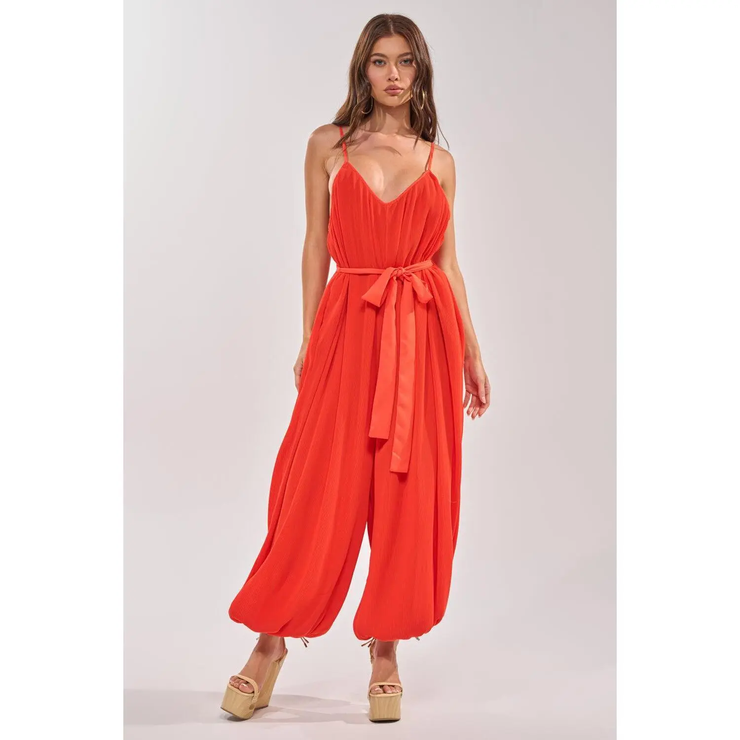 VACATIONING PLEATED JUMPSUIT IN ORANGE