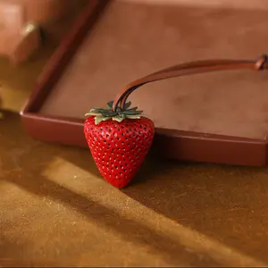 Handmade Resin Strawberry Bag Charm with High-Quality Leather Strap Unique Personalized Keychain Perfect for Holiday Gifts and Versatile Use as Bag Pendant or Hanging Ornament