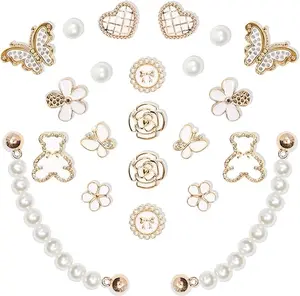 22pcs elegant shoe charms featuring pearls, flowers, butterflies and sparkling accents, adding stylish detail for parties, events and birthday celebrations
