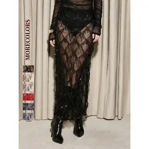 Women’s sexy sheer sequined fringe mesh midi skirt, ideal for parties, festivals, and balls; high-waisted slim-fit solid-color design, suitable for all seasons GARMENTARY