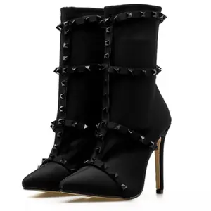Mid calf studded boot
