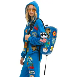 VINTAGE PATCH PUFFER BACKPACK - SNORKEL BLUE GLOSSY