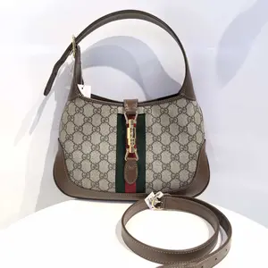 Pre-owned GUCCI Ophidia Jackie 1961 Underarm Bag in Premium Leather with Iconic GG Pattern and Adjustable Strap