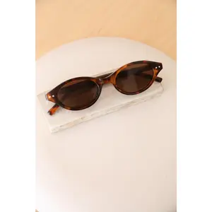 Rae: Oval Brown UV Sunglasses