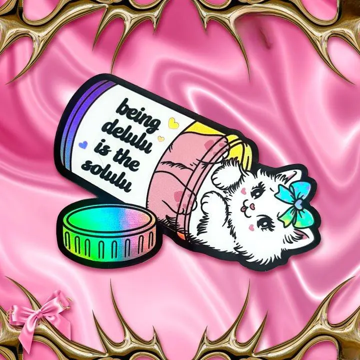 Being Delulu is the Solulu Kitty Cat Holographic Sticker by Moonstruck Crystals