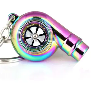 Creative Spinning Black Turbocharger Keychain - Polished Turbo Key Ring with Whistle Sound Feature, Metallic Finish, and Unique Design