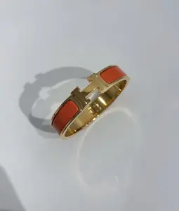 Pre-owned Hermes Clic H Bracelet Orange/Gold