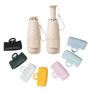 Mini Folding Umbrella with Hidden Handle, Compact Design for Men & Women, Lightweight Rain Protection Accessory, Includes Carrying Bag