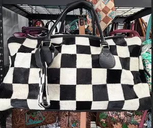 Genuine cowhide XL black & white checkered duffel with matching luggage tag