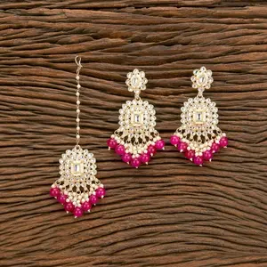 Kundan and bead work earrings and tika
