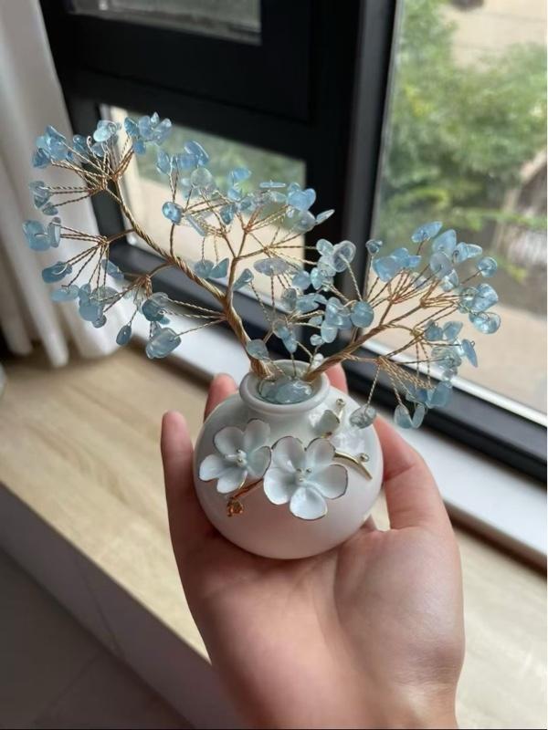 Aquamarine Money Tree - Decorative Plant with Blue Leaves and White Flowers in a White Vase