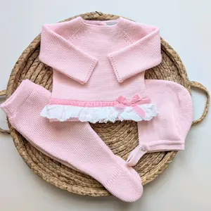 Knitted set made in the softest pastel pink yarn. with velvet bow, includes hat