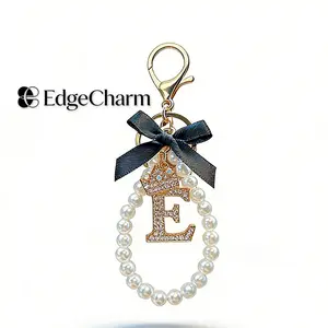 Bling Letter Keychain with Pearl Chain & Black Bow, Luxury Rhinestone Initial Car Key Ring, Elegant Bag Charm Accessory for Women