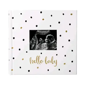 Baby photo album with guided journal pages,  polka dots.