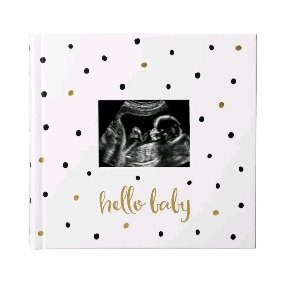 Baby photo album with guided journal pages,  polka dots.