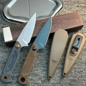 The 203 EDC fixed-blade knife features a compact design and a textured, non-slip handle, combining a stylish aesthetic with practical outdoor functionality.