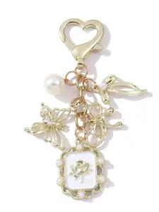 Elegant Hollow Butterfly Pearl Heart Bow Keychain, Y2K Trendy Bag Charm, Lipstick Holder Decoration, Memorial Gift for Friends and Family, Keychain for Bags
