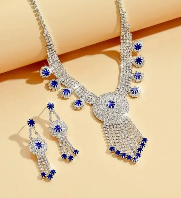 Rhinestones and blue rhinestone necklace and earrings set-51 Percent of Profits goes to Save the Children USA, which feeds starving children around the world