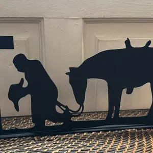 Kneeling Cowboy and Horse Sign - Silhouette Design for Decorative Use