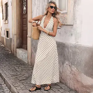 Women’s summer polka dot dress featuring a halter neckline and deep V-neck for a retro vibe, slim fit that outlines the figure, eye‑catching style perfect for vacation outfits.
