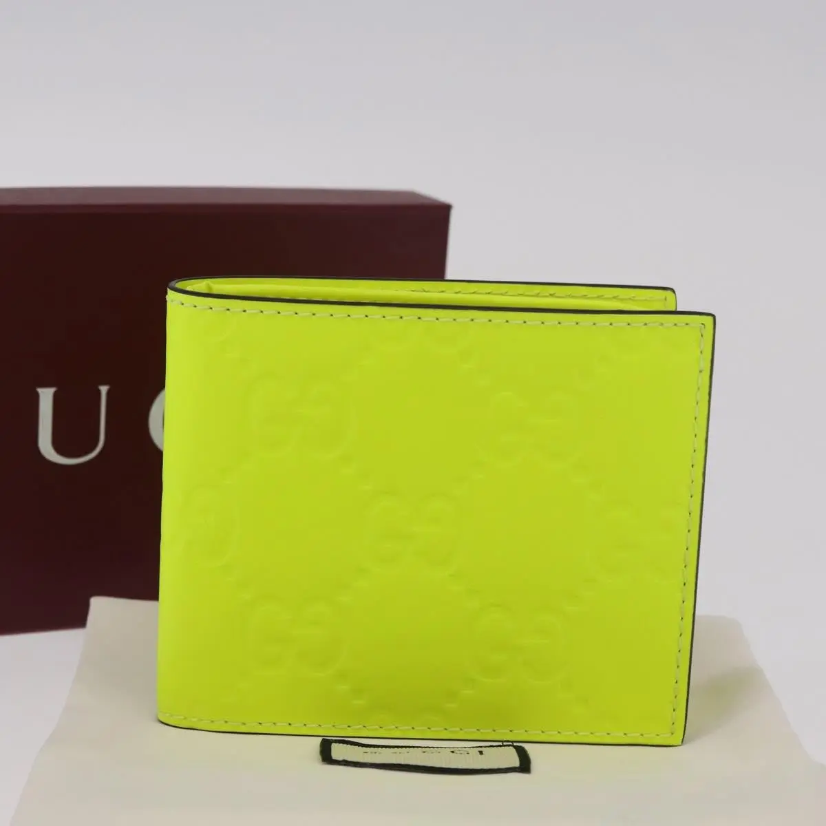 Pre-owned GUCCI FINAL SALE Small Leather Goods Brand New Rubber Effect GG Embossed Men's Bi Fold Wallet Fluorescent Yellow