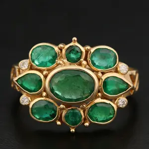 Vintage court-style synthetic emerald ring, with symmetrical flower cluster pave setting design, exquisite hollowed-out ring shank patterns, a luxurious wide-faced ring for ladies, bohemian-style vintage jewelry, exotic-style ring, a gift for her.