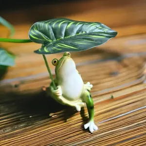 1pc frog ornaments holding leaves to cool off and shelter from the rain, creative and personalized home garden, courtyard and outdoor decor decoration ornaments, fish tank micro-landscape arrangement and landscaping tools, resin handicraft decorations