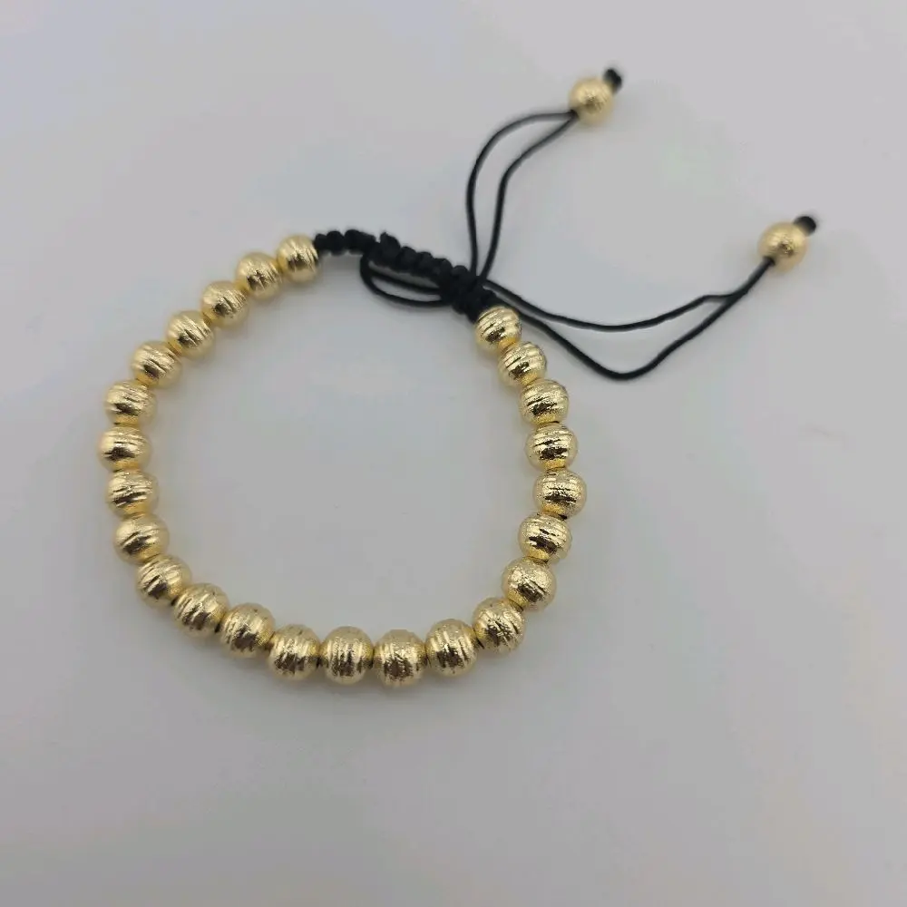 Pulsera Ajustable de Hilo con Balín Texturizado en Oro Laminado 14K