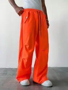 Men’s bright orange casual pants, street sports style—essential for concerts and music festivals; American retro athletic style, elastic waistband fabric, relaxed fit with an elastic waist, American campus style, trendy style.