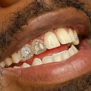 Double sided heart-shaped braces inlaid with peach heart hip-hop braces bingbing rap performance dental accessories