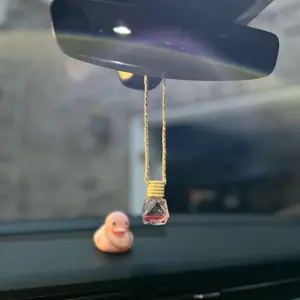 Car Scent - Featuring a Hanging Glass Container for Your Vehicle