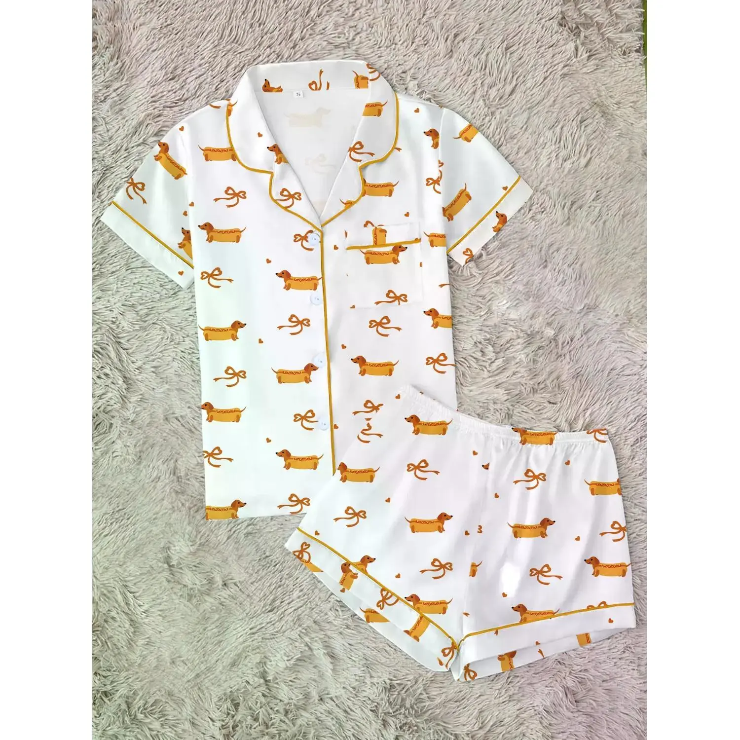 Whimsical Dachshund & Bow Print Women's Pajama Set | Adorable Hot Dog Button-Up Sleepwear | Soft Short Sleeve Summer Lounge Set with Orange Trim | Playful Sleepover PJs | Cozy Gift for Dog Lovers Knit Loungewear