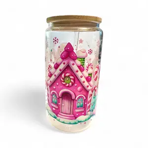 Sip Tok Vibes! 2025 Christmas 16 oz Glass Tumbler with Bamboo Lid and Straw Featuring the Pink Christmas Vibe with Gingerbread House and Adorable Gingerbread Girls.  Perfect for Holiday Beverages and Gifting to Family and Friends