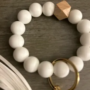 Cute silicone beaded keychain with leather, tassel and white