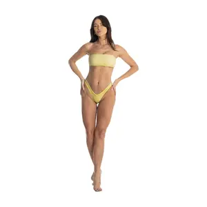 Doll is a two-piece bikini set with a tube top and a pink sparkly fabric. Doll also features a high-cut cheeky bottom. This swimsuit comes with removable padding. Fits true to size.