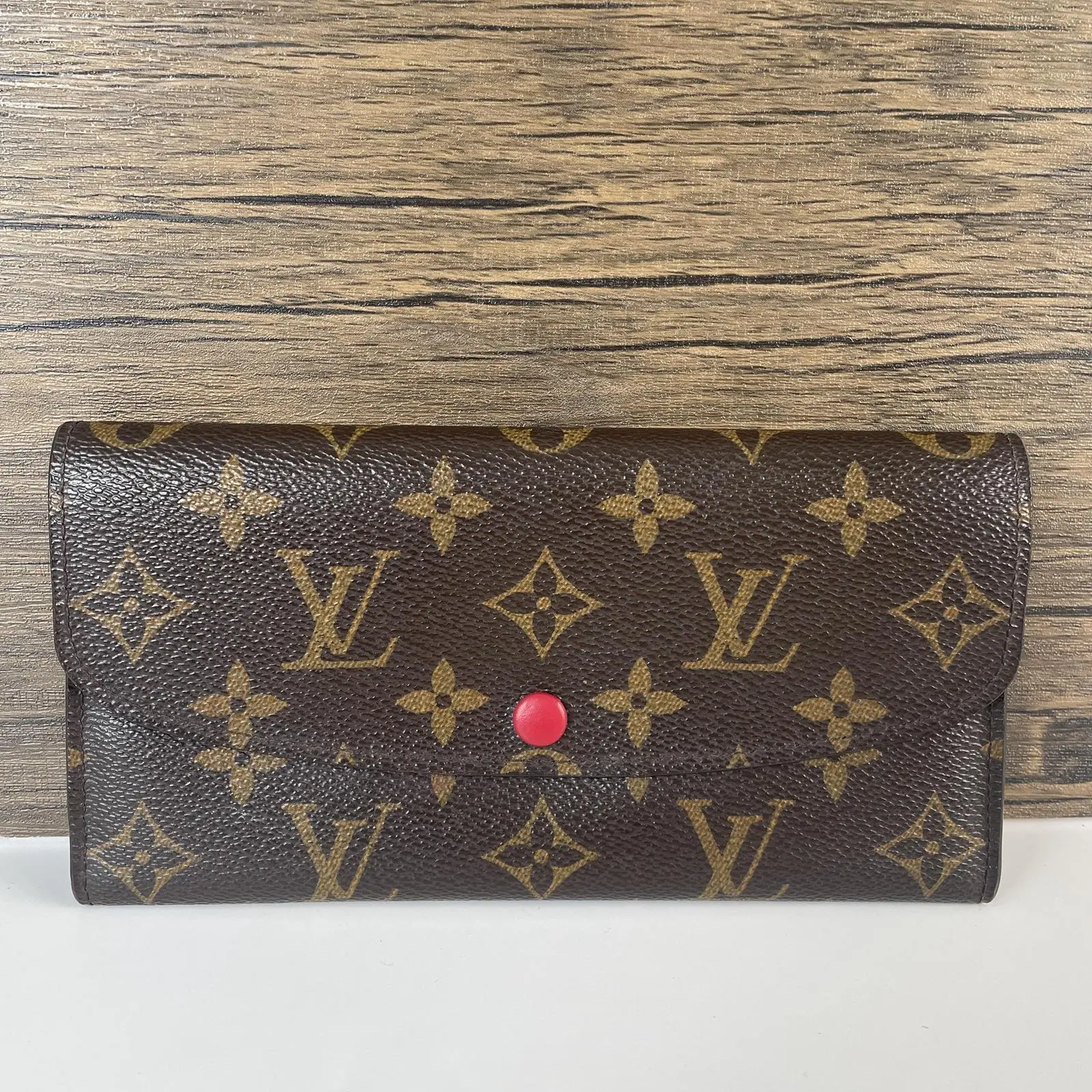 Pre-owned Louis Vuitton leather Mini Bags Monogram Coated Canvas Emilie Long Flap Wallet, Red Snap Button++chain++