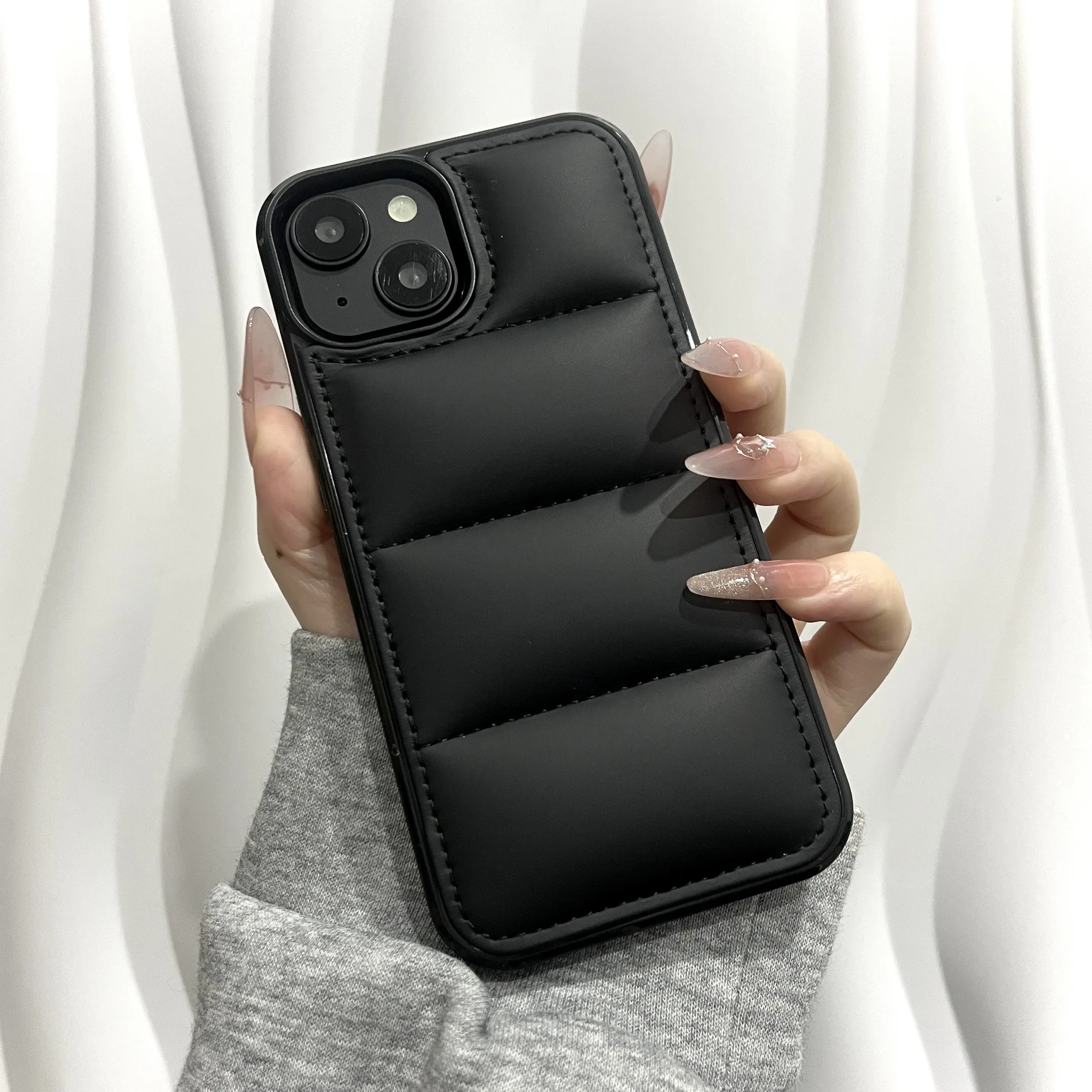 Suitable for the 16, 15, 14, 13 Pro Max Plus, and 11, 12 models, this luxurious down jacket phone case features a classic design and soft silicone material, providing shock and scratch protection.iphone 17/16 case/15 promax case/14 case/ 13 case