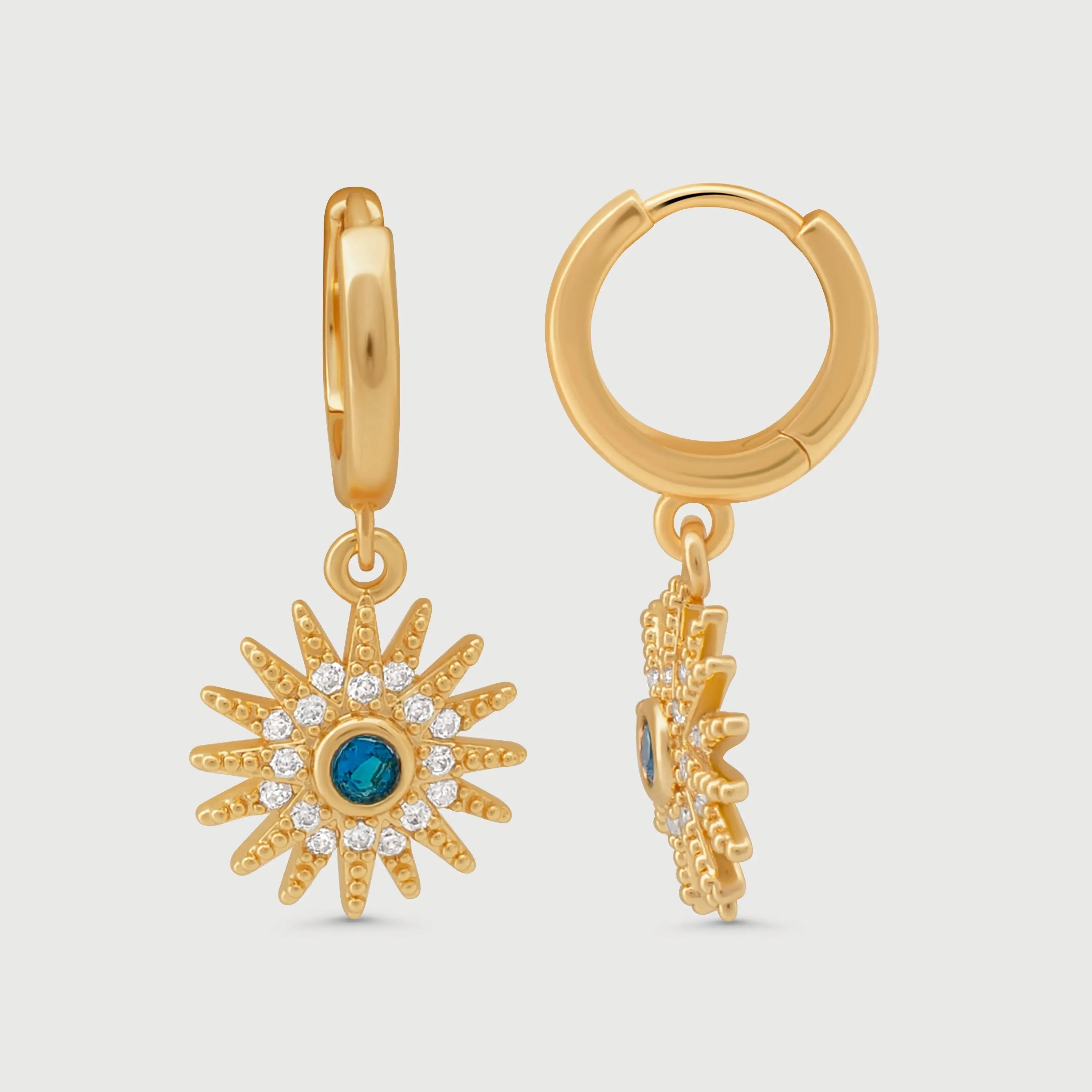 Starburst Earrings Celestial Burst Huggie Hoops with Radiant Starburst Charm Blue Sapphire Crystal Center and Twinkling Clear Crystals