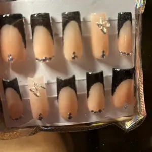 Glitz and glam nails. Cute and affordable nails. Just ask for the design and it will be hand made with love!