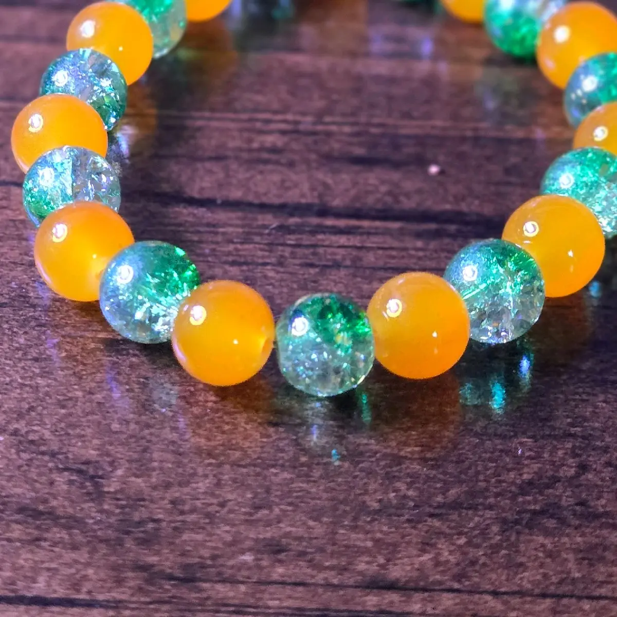 beautiful green crackle and orange glass bead bracelet