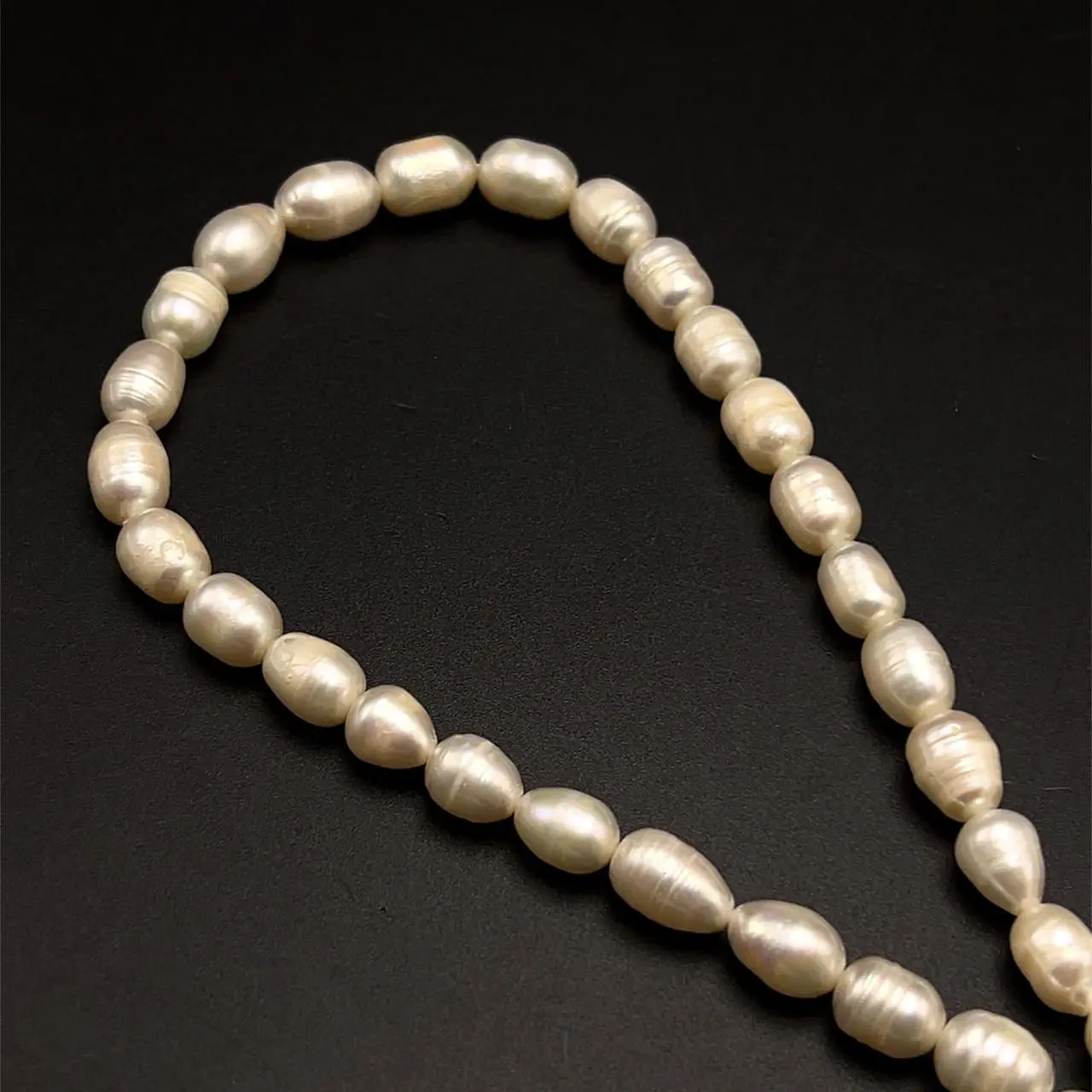 Freshwater Pearl Strand | 9x7mm Ivory Color Drop Oval | 42 Pcs 147.83 Carats | 15.5 Inch | Organic Pearl Strands Jewelry Making
