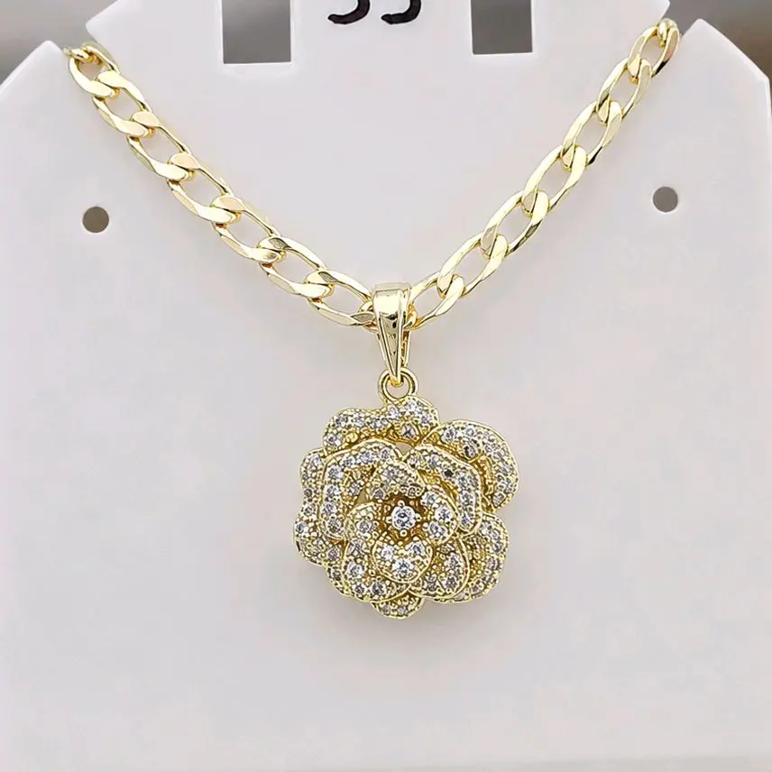 Cadena cubana con dije de rosa  de zc...medida 22 inches . Laminado 14k
