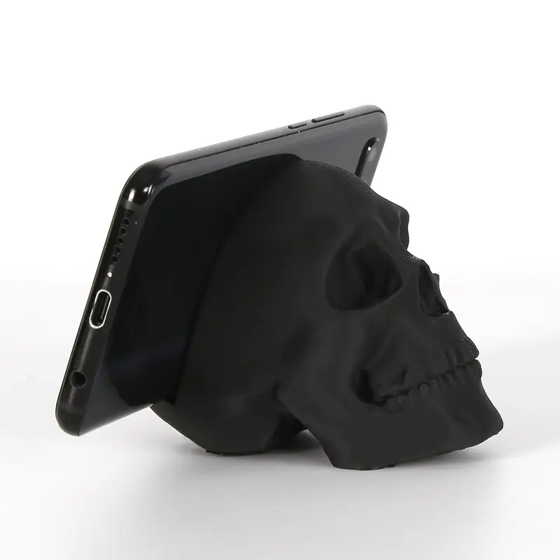 1pc Skull Head Phone Stand, Black Plastic Mobile Holder for Hands-free Video Watching, Perfect for Bedside, Living Room, Office Desk, Halloween, Universal Smartphone Holder, Stable Phone Rack, Phone Holder Design, Cell Phone Holder