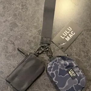 Lulu Mac Black/Camo Wristlet Pouch - Durable Fabric with Detachable Strap for Everyday Use - Ideal for Keys Cards and Coins - Trendy and Practical Accessory