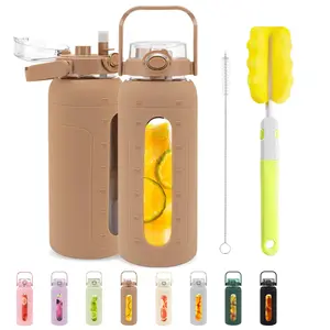 Tronco 64oz Glass Water Bottles with Straw Lid and Time Marker Half Gallon Large Motivational Water Bottle with Silicone Sleeve 2L Refillable Water Jug Bottle for Gym Home Workout BPA FreeKhaki