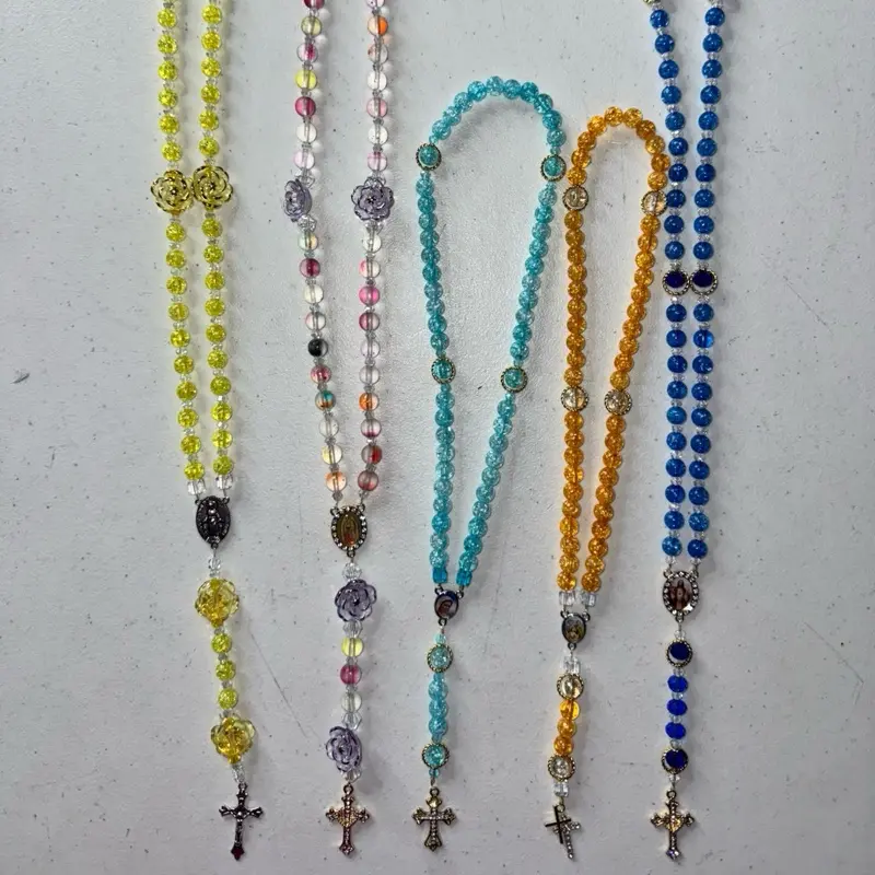 Heavenly Bloom Collection Stretchy Cord on the Go Rosaries with Blue, powdered blue, orange, yellow & flowered collared Beads and Cross Charm