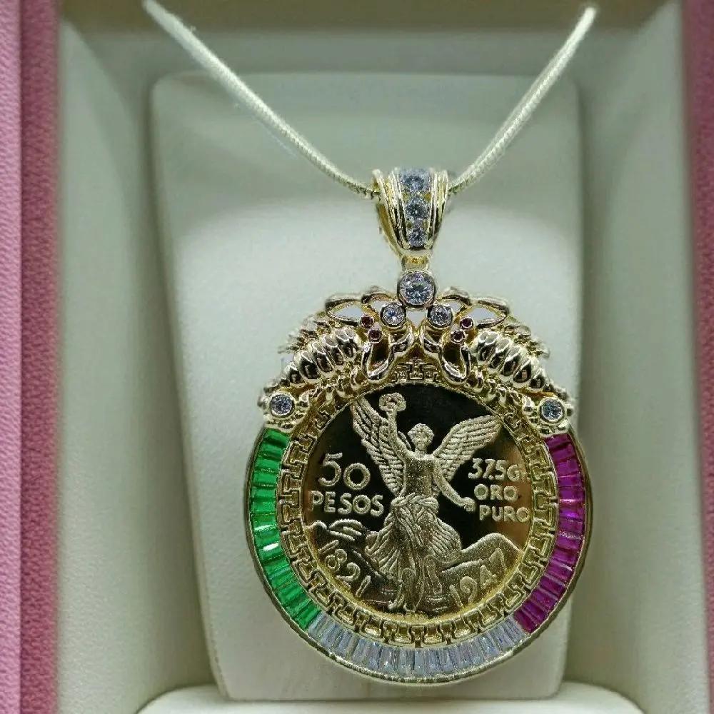 14k gold-plated medal