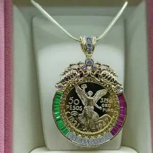 14k gold-plated medal