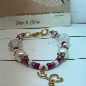 Eden & Eloise Elegant Beaded Bracelet with Gold nurse  Heart Charm and Pearl Accents for Women's Fashion