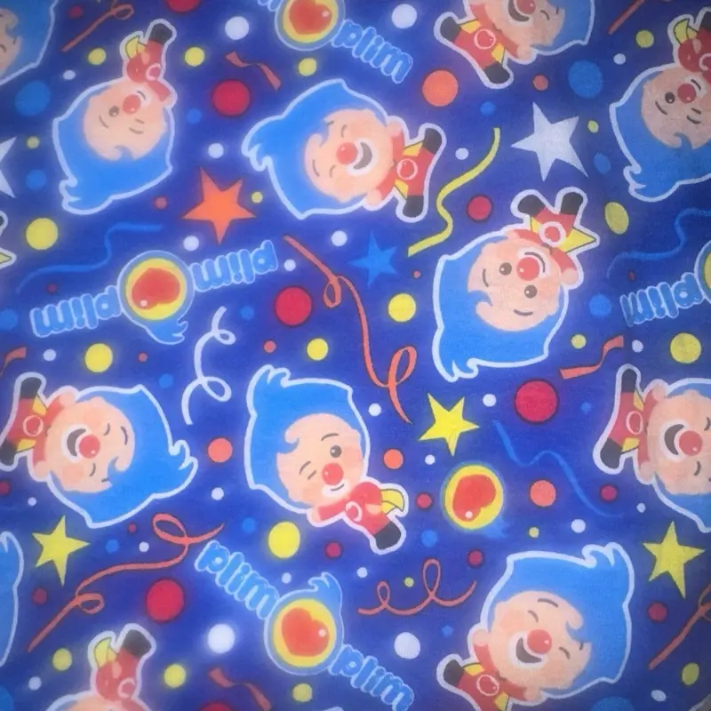 Plin Plin 3 Yard Printed Fabric with Colorful Characters and Stars on a Blue Background